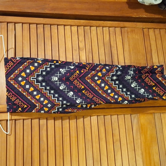 Terra & Sky Black and Orange Patterned Leggings - Picture 1 of 3